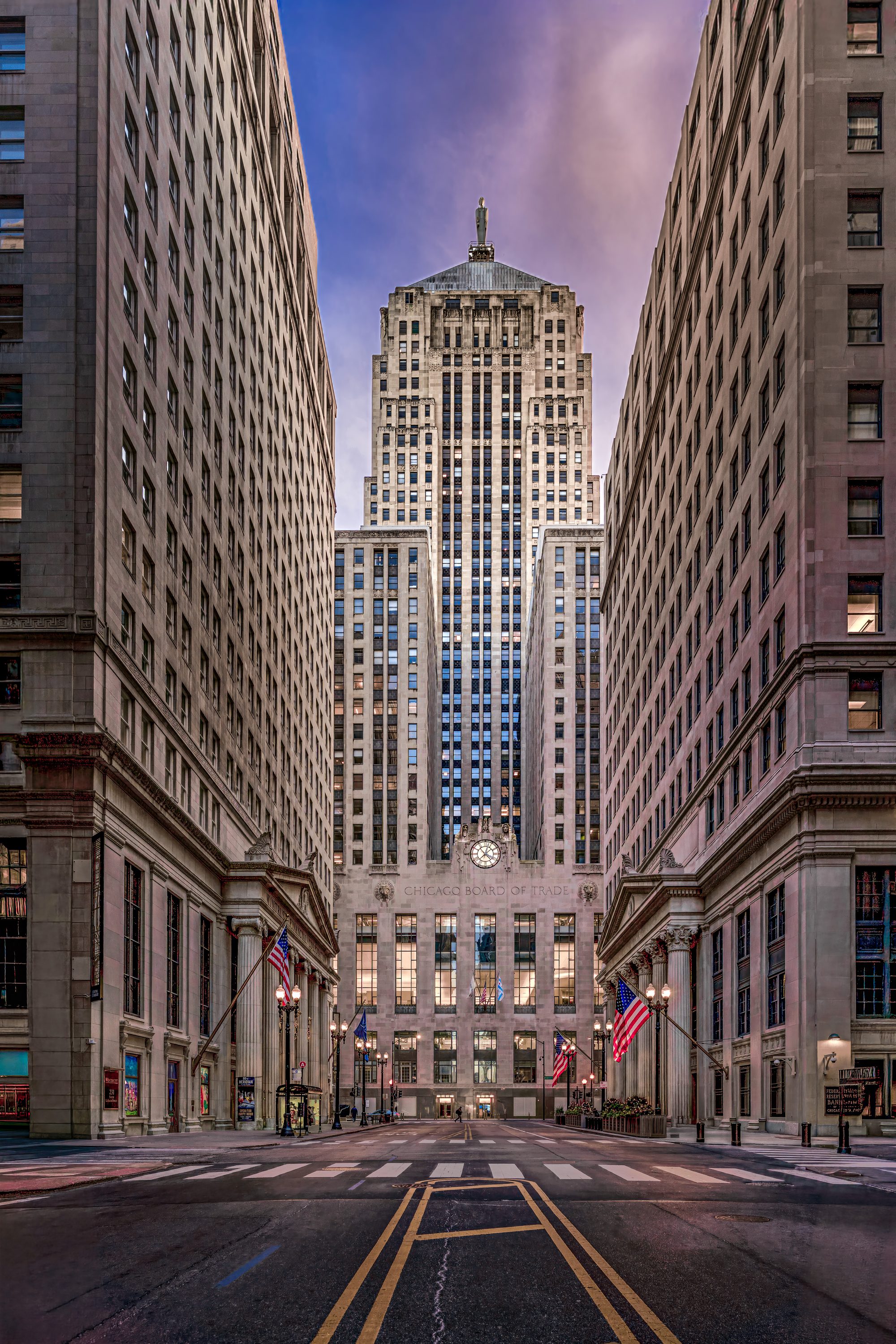 Chicago Board of Trade and Ceres at blue hour, flanked by Wintrust and the Federal Reserve Bank of Chicago, LaSalle Street