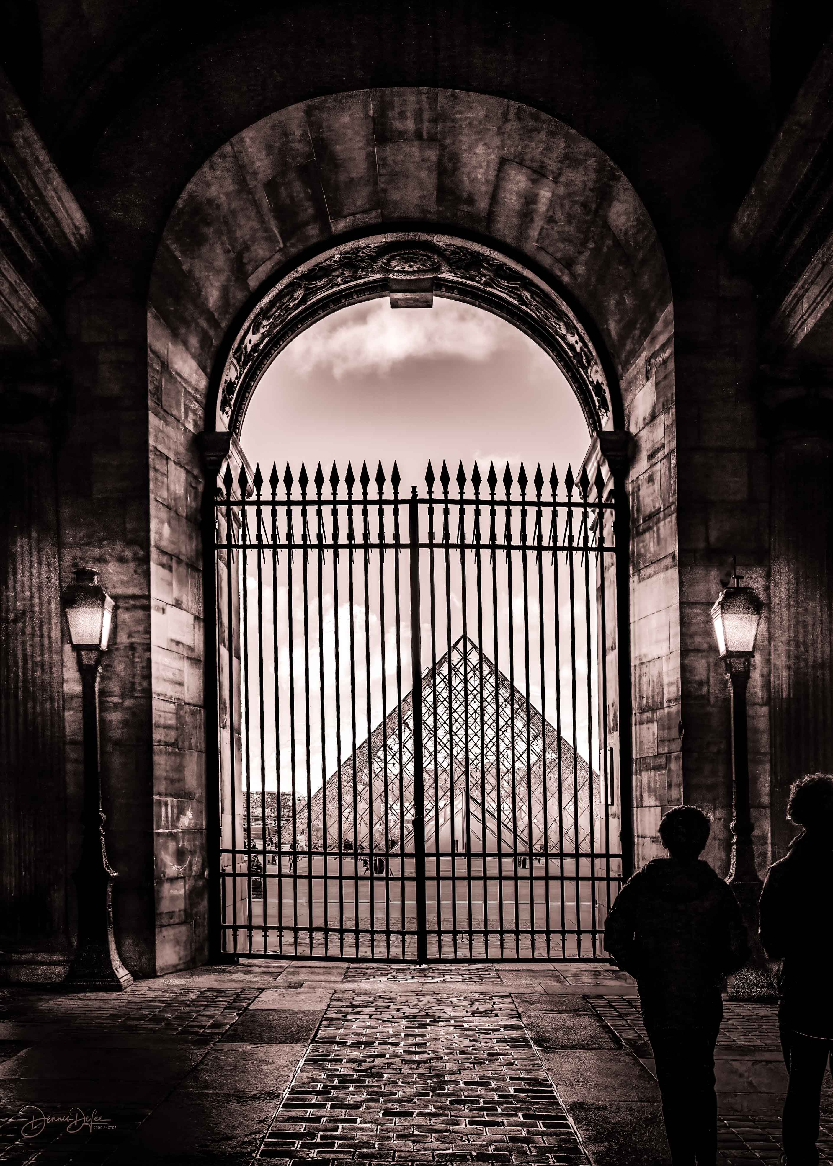 Louvre gallery arched ceiling receding into the distance